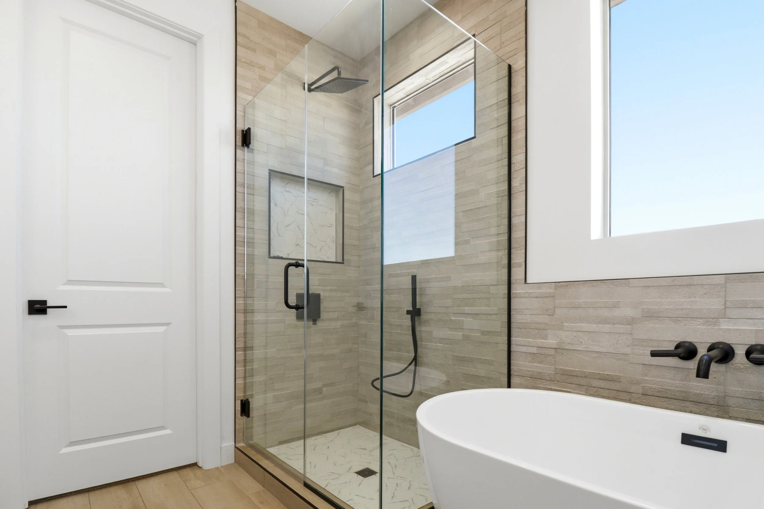 Custom tiled shower in a Jematell Homes build in Apache Junction, AZ
